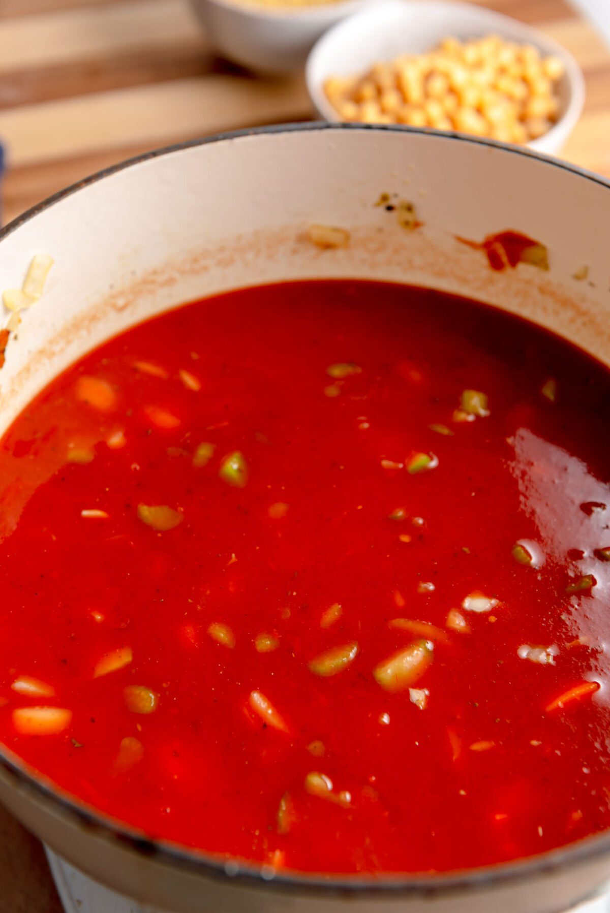 Tomato soup cooking in a pot.